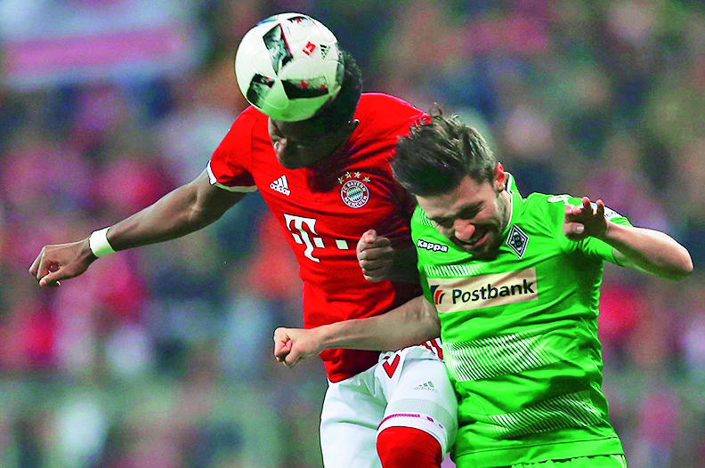 87440-114072-2016-10-22T170629Z_529929749_LR1ECAM1BIJ3F_RTRMADP_3_SOCCER-GERMANY-BAY-MON