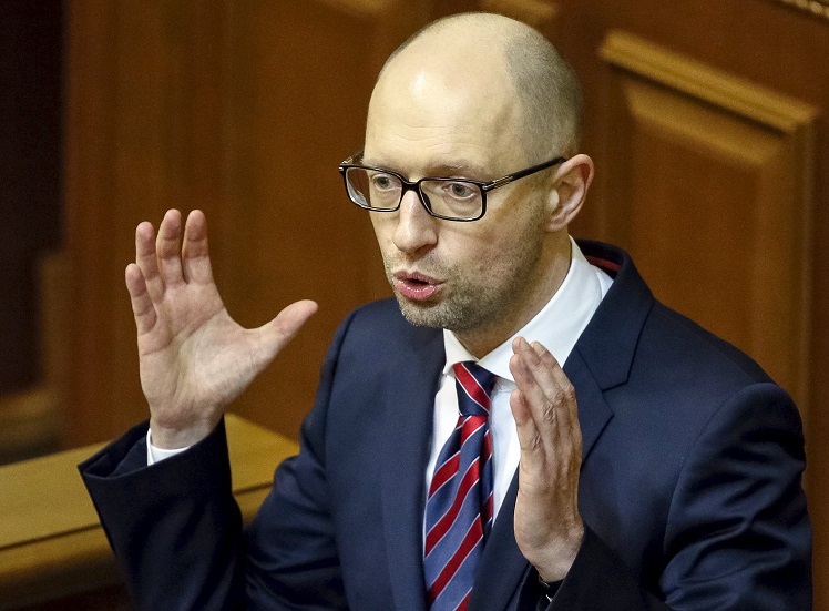 Ukraine's Prime Minister Arseny Yatseniuk delivers a speech during a parliament session in Kiev, Ukraine, February 16, 2016.   REUTERS/Gleb Garanich