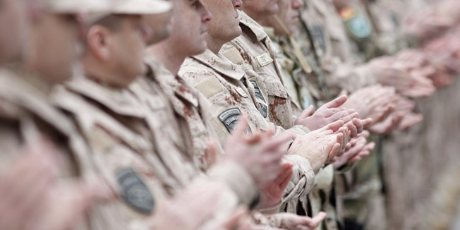 Zagreb, 040315.Predsjednica Republike i vrhovna zapovjednica Oruzanih snaga RH Kolinda Grabar Kitarovic nazocila je u Vojarni Pukovnik Marko Zivkovic na Plesu ispracaju 2. hrvatskog kontigenta u misiju Resolute Support u Islamsku Republiku Afganistan.Na fotografiji: vojnici - pljesak.Foto: Dragan Matic / CROPIX