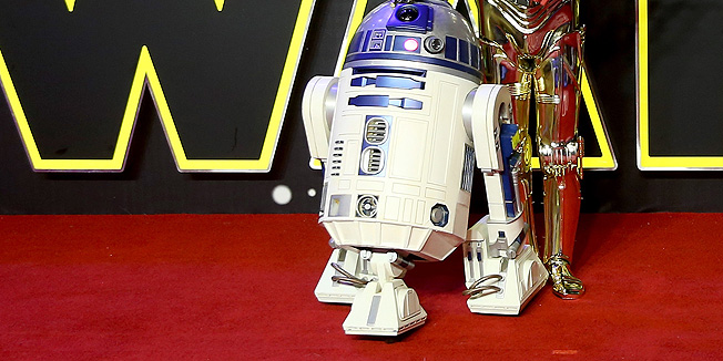 LONDON, ENGLAND - DECEMBER 16:  R2-D2 and C-3PO attend the European Premiere of 