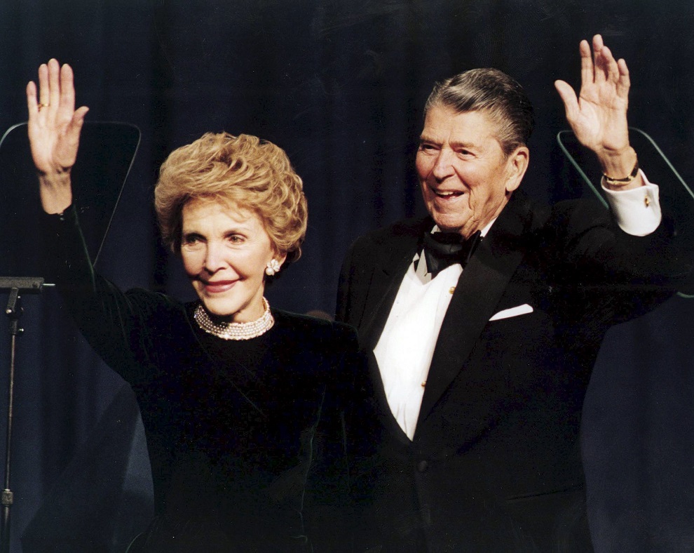 Former U.S. President Ronald Reagan and his wife Nancy wave while attending a gala celebrating his 83rd birthday in Washington in this  February 3, 1994 file photo. REUTERS/Mike Theiler/Files      TPX IMAGES OF THE DAY     