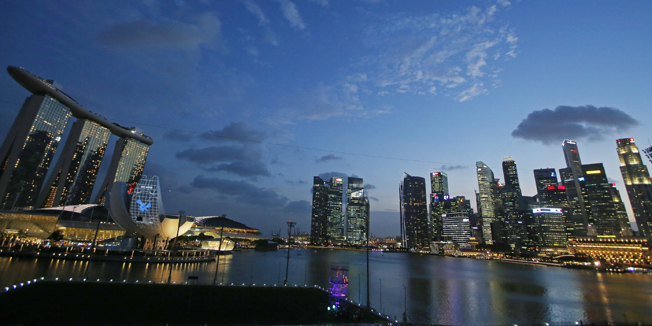 A view of Singapore's skyline is seen in this March 2, 2016 file photo. The Economist Intelligence Unit (EIU) on March 10, 2016 ranked Singapore as the world's most expensive city to live in for the third consecutive year. REUTERS/Edgar Su