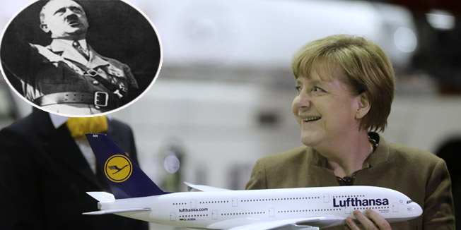 German Chancellor Angela Merkel smiles after receiving a model of the A300-800 'Deutschland' airplane during an aircraft christening ceremony at the Lufthansa Technik facility in Frankfurt, Germany November 18, 2015.    REUTERS/Kai Pfaffenbach  - RTS7SO2