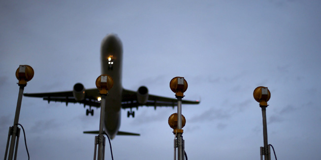 A LAN Airlines plane lands at Santiago International Airport, Chile, in this January 27, 2016 file photo.  REUTERS/Ivan Alvarado/Files                             GLOBAL BUSINESS WEEK AHEAD PACKAGE - SEARCH 