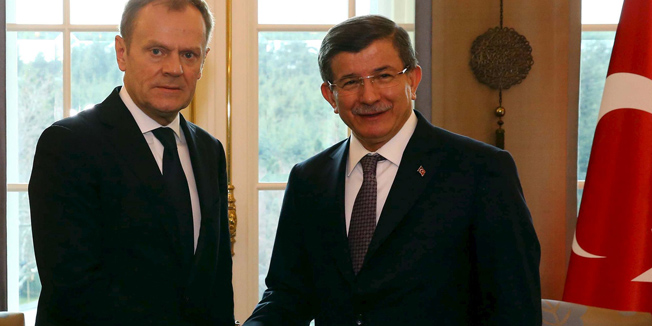 Turkish Prime Minister Ahmet Davutoglu (R), meets with European Council President Donald Tusk in Ankara, Turkey March 3, 2016 in this handout photo provided by the Prime Minister's Press Office. REUTERS/Hakan Goktepe/Prime Minister's Press Office/Handout via Reuters ATTENTION EDITORS - THIS IMAGE WAS PROVIDED BY A THIRD PARTY. REUTERS IS UNABLE TO INDEPENDENTLY VERIFY THE AUTHENTICITY, CONTENT, LOCATION OR DATE OF THIS IMAGE. FOR EDITORIAL USE ONLY. NOT FOR SALE FOR MARKETING OR ADVERTISING CAMPAIGNS. NO RESALES. NO ARCHIVE. THE PICTURE IS DISTRIBUTED EXACTLY AS RECEIVED BY REUTERS, AS A SERVICE TO CLIENTS. NO RESALES. NO ARCHIVE.