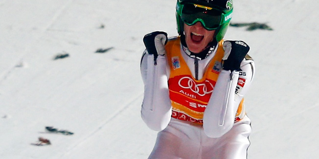 Peter Prevc of Slovenia celebrates after he won the overall ranking of the 64th four-hills Ski jumping tournament in Bischofshofen, Austria, January 6, 2016. Prevc won the tournament ahead of Severin Freund of Germany and Austria's Michael Hayboeck. REUTERS/Dominic Ebenbichler   - RTX21ATT