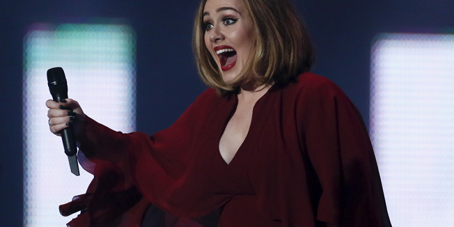 Adele arrives to accept the award for best British single at the BRIT Awards at the O2 arena in London, February 24, 2016. REUTERS/Stefan Wermuth  EDITORIAL USE ONLY - RTX28FRH
