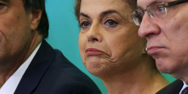 Brazil's President Dilma Rousseff (C), General Attorney Jose Eduardo Cardozo (L) and Justice Minister Eugenio Aragao attend a meeting with jurists at Planalto Palace in Brasilia, Brazil, March 22, 2016. REUTERS/Adriano Machado