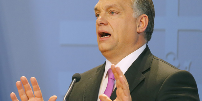 Hungarian Prime Minister Viktor Orban addresses news conferece with British Prime Minister David Cameron (not pictured) in Budapest, Hungary January 7, 2016. REUTERS/Laszlo Balogh 