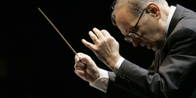 Italian Academy award-winning music composer Ennio Morricone conducts during the Mawazine Festival in Rabat May 15, 2009. The annual music festival, which features musicians from around the world, will run from May 15 to May 23. REUTERS/Rafael Marchante (MOROCCO ENTERTAINMENT) - RTXHGCP