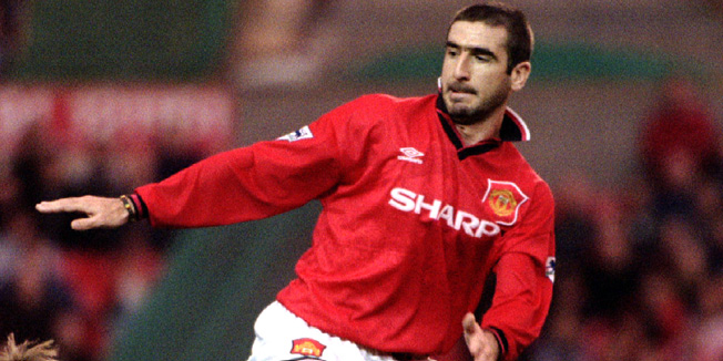 Manchester United's Eric Cantona (R) clashes with Middlesborough's Nicky Barmby at Old Trafford October 28. Despite losing Keane United won the Premier League clash 2-0 with goals from Gary Pallister and Andy Cole, taking them to within one point of leaders Newcastle - RTXFN1K