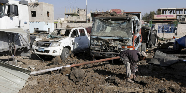Worker inspects damage at a car maintenance workshop after it was hit by a Saudi-led air strike in Yemen's capital Sanaa January 28, 2016. REUTERS/Khaled Abdullah