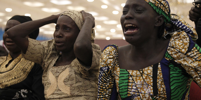 Parents of the Chibok girls cry during their meeting with Nigeria's President Muhammadu Buhari at the presidential villa in Abuja, Nigeria, January 14, 2016. REUTERS/Afolabi Sotunde