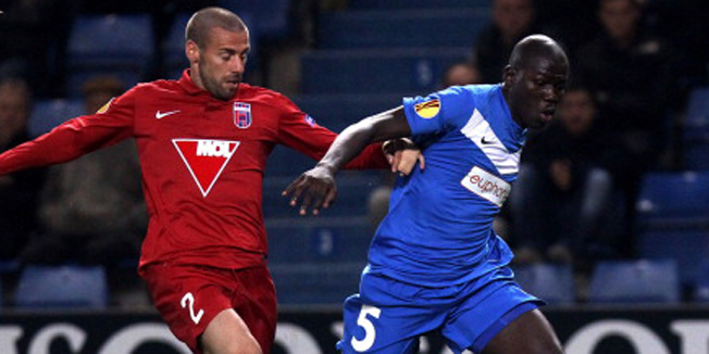 GENK, BELGIUM - SEPTEMBER 20:  Kalidou Koulibaly (R) of KRC Genk shields the ball from Alvaro Brachi of Videoton FC during the UEFA Europa League group stage match between KRC Genk and Videoton FC on September 20, 2012 at the KRC Genk Arena in Genk, Belgium. (Photo by Virginie Lefour/EuroFootball/Getty Images)
