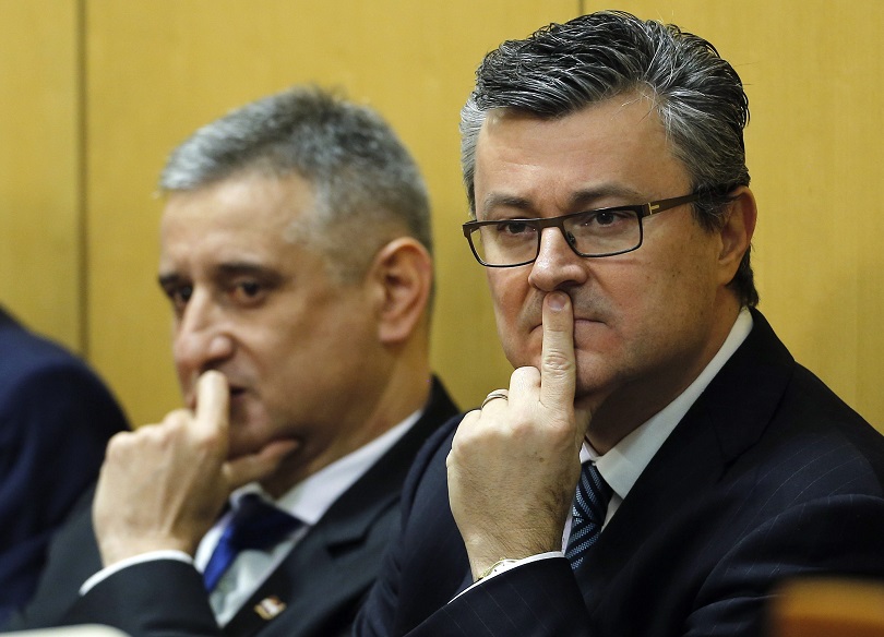Croatia's Prime Minister-designate Tihomir Oreskovic (R) and new First Deputy Prime Minister Tomislav Karamarko seek approval for the new government in parliament in Zagreb, Croatia, January 22, 2016. REUTERS/Antonio Bronic