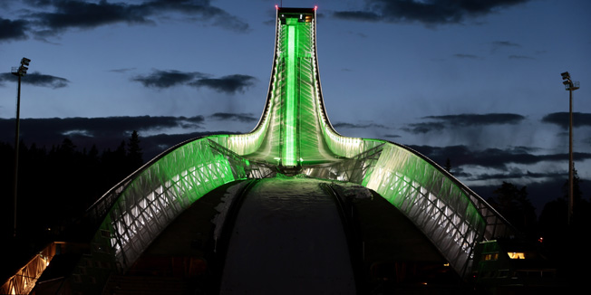The Holmenkollen ski jump is lit with green floodlights, in Oslo March 12, 2014. The ski jump will be lit in green from Wednesday till March 17, 2014, to commemorate Ireland's National Day, also known as St. Patrick's Day, in a campaign organised by Irish tourism authorities. REUTERS/Hakon Mosvold Larsen/NTB Scanpix (NORWAY - Tags: SPORT SKIING TRAVEL ANNIVERSARY TPX IMAGES OF THE DAY) ATTENTION EDITORS - THIS IMAGE HAS BEEN SUPPLIED BY A THIRD PARTY. IT IS DISTRIBUTED, EXACTLY AS RECEIVED BY REUTERS, AS A SERVICE TO CLIENTS. NORWAY OUT. NO COMMERCIAL OR EDITORIAL SALES IN NORWAY. NO COMMERCIAL SALES - RTR3GUIW