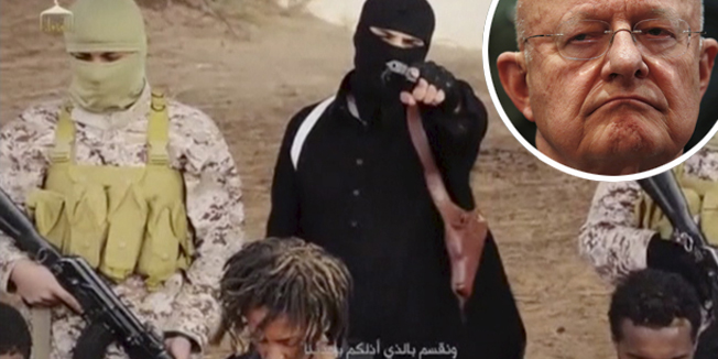 An Islamic State militant holds a gun while standing behind what are said to be Ethiopian Christians in Wilayat Fazzan, in this still image from an undated video made available on a social media website on April 19, 2015. The video purportedly made by Islamic State and posted on social media sites on Sunday appeared to show militants shooting and beheading about 30 Ethiopian Christians in Libya. Reuters was not able to verify the authenticity of the video but the killings resemble past violence carried out by Islamic State, an ultra-hardline group which has expanded its reach from strongholds in Iraq and Syria to conflict-ridden Libya. Libyan officials were not immediately available for comment. Ethiopia said it had not been able to verify whether the people shown in the video were its citizens. REUTERS/Social Media Website via Reuters TV??ATTENTION EDITORS - THIS PICTURE WAS PROVIDED BY A THIRD PARTY VIDEO. REUTERS IS UNABLE TO INDEPENDENTLY VERIFY THE AUTHENTICITY, CONTENT, LOCATION OR DATE OF THIS IMAGE. THIS PICTURE IS DISTRIBUTED EXACTLY AS RECEIVED BY REUTERS, AS A SERVICE TO CLIENTS. - RTR4XX9M