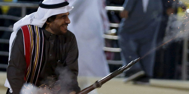A Saudi man fires a weapon as he performs a traditional dance during Janadriyah Culture Festival on the outskirts of Riyadh, Saudi Arabia February 8, 2016. REUTERS/Faisal Al Nasser TPX IMAGES OF THE DAY     