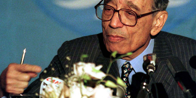 UN Secretary-General Boutros Boutros-Ghali gestures during a news conference in Rome November 12. Boutros-Ghali confirmed that Canada was ready to command a multinational force in Zaire and said he hoped it would have logistical support from the United States. - RTXGG4B