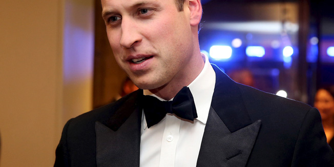  Prince William, Duke of Cambridge (R) meets charity representatives as he attends The Cinema and Television Benevolent Fund's Royal Film Performance 2015 of the new James Bond 007 film 