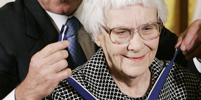 U.S. President George W. Bush (L) awards the Presidential Medal of Freedom to American novelist Harper Lee (R) in the East Room of the White House, in this November 5, 2007, file photo. Lee, who wrote one of America's most enduring literary classics, 