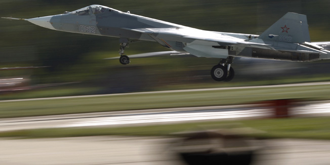 Russian Sukhoi T-50 PAK-FA jet fighter lands after a demonstration flight at the MAKS International Aviation and Space Salon in Zhukovsky outside Moscow August 27, 2013. The world's top aircraft makers, scenting a major opportunity in replacing ageing Russian air fleets, will be touting their wares at Moscow's MAKS air show this week in the hope of winning a big slice of that multi-billion dollar market.  REUTERS/Maxim Shemetov (RUSSIA - Tags: TRANSPORT BUSINESS MILITARY) - RTX12XXC