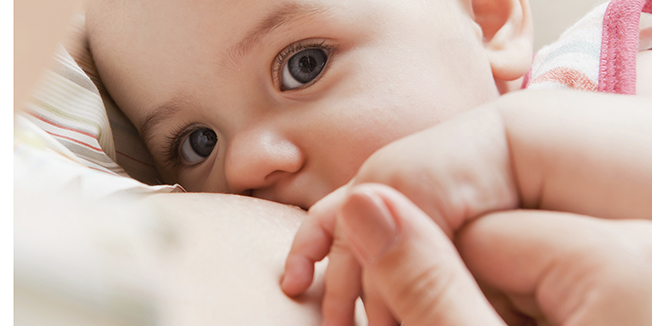 Mother care. Breast feeding baby.