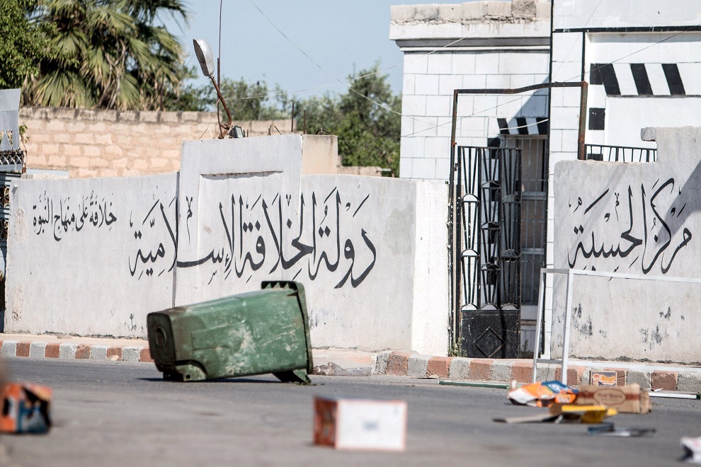 A deserted stronghold that belonged to Islamic State fighters is seen in Tel Abyad town, Raqqa governorate, in this June 16, 2015 file photo. Islamic State fighters attacked the town of Tel Abyad controlled by the Syrian Kurdish YPG militia at the Turkish border as well as the nearby town of Suluk on February 27, 2016, YPG spokesman Redur Xelil and Turkish security sources told Reuters. The text on the wall reads: 