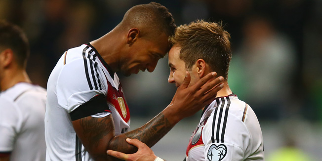 FRANKFURT AM MAIN, GERMANY - SEPTEMBER 04:  Mario Goetze (R) of Germany celebrates with Jerome Boateng after scoring his teams third goal during the EURO 2016 Qualifier Group D match between Germany and Poland at Commerzbank-Arena on September 4, 2015 in Frankfurt am Main, Germany.  (Photo by Alex Grimm/Bongarts/Getty Images)