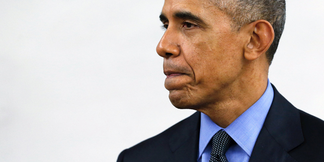 U.S. President Barack Obama pauses during remarks on the recent shootings in San Bernardino, after meeting with victims' families at Indian Springs High School in San Bernardino, California December 18, 2015. REUTERS/Jonathan Ernst