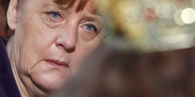 German Chancellor Angela Merkel attends a reception for Sternsinger (carol singers) at the Chancellery in Berlin, Germany, January 5, 2016. Merkel annually receives children who take part in the Sternsinger project, collecting money for charity programs that help children in need around the world.  REUTERS/Hannibal Hanschke 