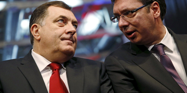 Milorad Dodik (L), president of the Republika Srpska, and Serbian Prime Minister Aleksandar Vucic attend the official celebration ceremony of Republika Srpska Statehood Day in Banja Luka, Bosnia and Herzegovina, January 9, 2015. Bosnian Serbs organised celebrations of the Statehood Day of their half of Bosnia despite the constitutional court's ruling to change the date for the holiday which was found to discriminate against other ethnic groups because it is also celebrated as an Orthodox holiday.  REUTERS/Dado Ruvic