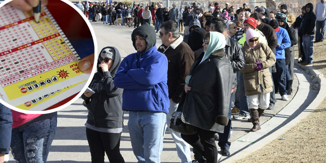 Hundreds of people wait in line to purchase tickets for the Powerball lottery at the CA lotto store in San Bernardino County, California, on the California-Nevada state line January 9, 2016.  Millions of Americans anxiously awaited Saturday night's drawing in the multi-state Powerball lottery hoping to win a jackpot that has climbed to a record $900 million and could top $1 billion before the frenzy to buy tickets ends, officials said.  California, the nation's most populous state, normally sees Powerball sales of $1 million a day, but on Saturday morning sales were a head-spinning $2.8 million an hour, said California Lottery spokesman Mike Bond.   REUTERS/Gene Blevins