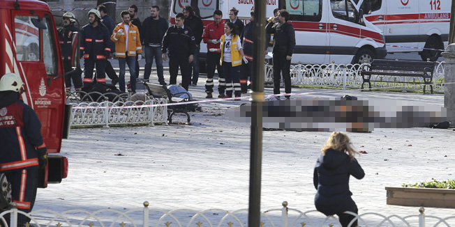 ATTENTION EDITORS - VISUALS COVERAGE OF SCENES OF DEATH OR INJURY Rescue teams gather at the scene after an explosion in central Istanbul, Turkey January 12, 2016. Turkish police sealed off a central Istanbul square in the historic Sultanahmet district on Tuesday after a large explosion, a Reuters witness said, and the Dogan news agency reported several people were injured in the blast. REUTERS/Kemal Aslan      TPX IMAGES OF THE DAY     TEMPLATE OUT.
