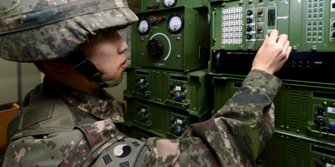 A South Korean soldier operates loudspeakers, just south of the demilitarized zone separating the two Koreas, in Yeoncheon, South Korea, January 8, 2016.  REUTERS/Korea Pool/Yonhap ATTENTION EDITORS - FOR EDITORIAL USE ONLY. NOT FOR SALE FOR MARKETING OR ADVERTISING CAMPAIGNS. THIS IMAGE HAS BEEN SUPPLIED BY A THIRD PARTY. IT IS DISTRIBUTED, EXACTLY AS RECEIVED BY REUTERS, AS A SERVICE TO CLIENTS. SOUTH KOREA OUT. NO COMMERCIAL OR EDITORIAL SALES IN SOUTH KOREA. NO RESALES. NO ARCHIVES.