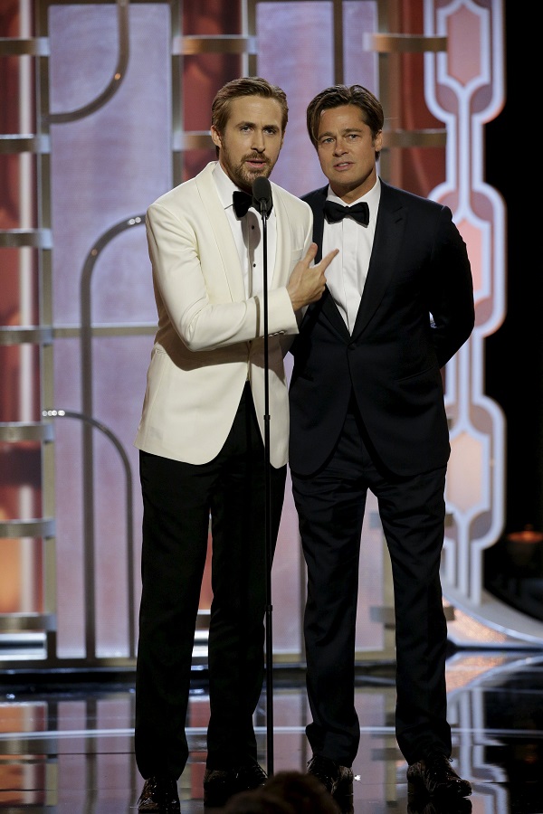 Ryan Gosling (L) and Brad Pitt present at the 73rd Golden Globe Awards in Beverly Hills, California January 10, 2016.  REUTERS/Paul Drinkwater/NBC Universal/Handout For editorial use only. Additional clearance required for commercial orpromotional use. Contact your local office for assistance. Any commercial or promotional use of NBCUniversal content requires NBCUniversal's prior written consent. No book publishing without prior approval. TPX IMAGES OF THE DAY     