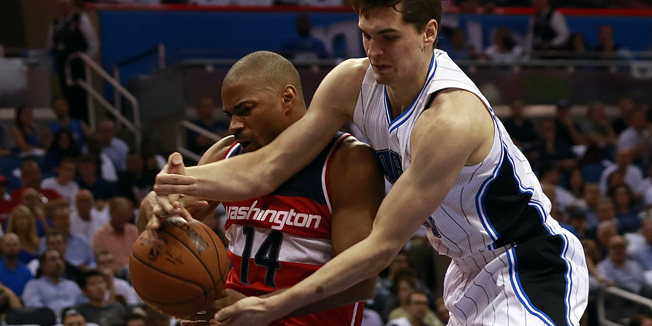 Oct 28, 2015; Orlando, FL, USA; Washington Wizards guard Gary Neal (14) and Orlando Magic forward Mario Hezonja (23) go after he rebound during the second half at Amway Center. Washington Wizards defeated the Orlando Magic 88-87. Mandatory Credit: Kim Klement-USA TODAY Sports - RTX1TQ7A