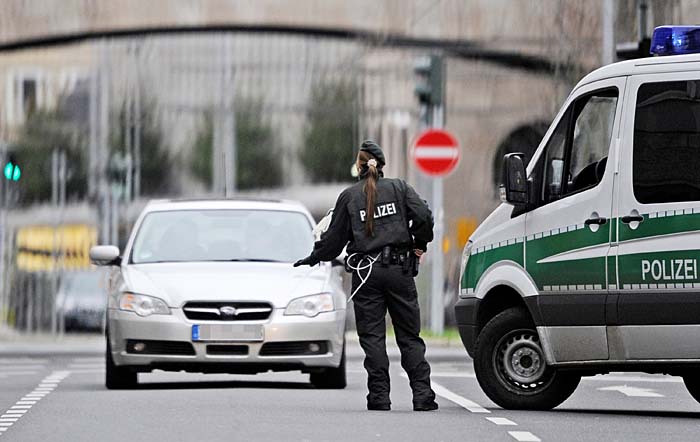 German police stop a car during a manhunt for Peter Paul Michalski, 46, on November 29, 2009 in Muelheim, western Germany, after they had arrested Michael Heckhoff, the other of two fugitive criminals who fled their prison in Aachen, western Germany on the evening of November 26, 2009. Police commandos arrested on November 29, 2009 Heckhoff, 50, one of the two 