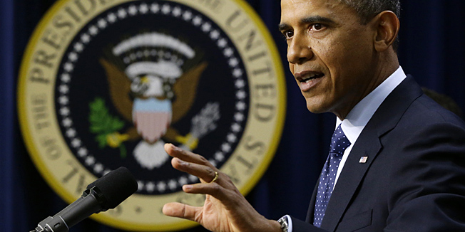 President Barack Obama gestures as he speaks about the fiscal cliff, Monday, Dec. 31, 2012, in the South Court Auditorium at the White House in Washington. The president said it appears that an agreement to avoid the fiscal cliff is 