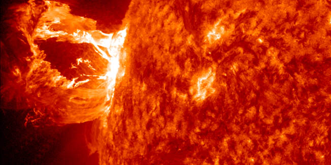This image provided by NASA shows the sun releasing a M1.7 class flare associated with a prominence eruption on April, 16, 2012. This image was taken by the Solar Dynamics Observatory. This visually spectacular explosion occurred on the sun's Northeastern limb (left) and was not Earth directed. (AP Photo/NASA/SDO/AIA)
