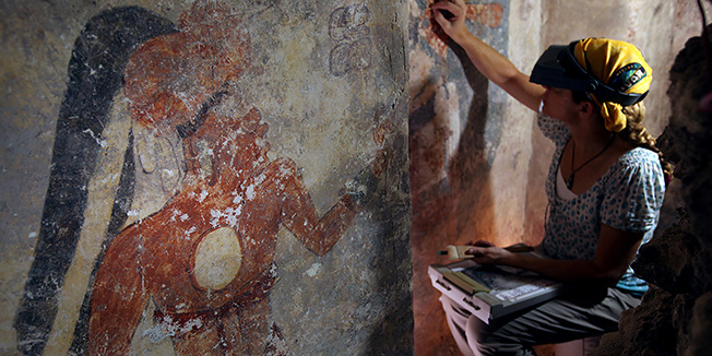 In this undated photo made available by National Geographic, conservator Angelyn Bass cleans and stabilizes the surface of a wall of a Maya house that dates to the 9th century A.D. in the Maya city Zultun in northeastern Guatemala. Archaeologists have found the small room where royal scribes apparently used walls like a blackboard to keep track of astronomical records and the society's intricate calendar some 1,200 years ago. Anthony Aveni of Colgate University, along with William Saturno of Boston University and others, are reporting the discovery in the Friday, May 11, 2012 issue of the journal Science. (AP Photo/National Geographic, Tyrone Turner)