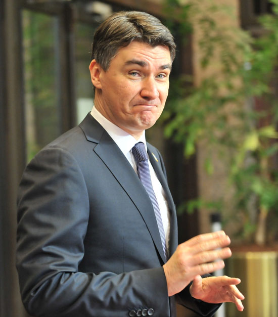 Prime Minister of Croatia Zoran Milanovic grimaces on January 30, 2012  prior a working session at the EU Headquarters in Brussels.  AFP PHOTO GEORGES GOBET