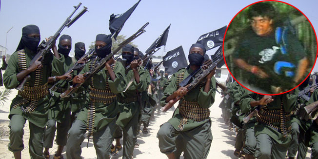 FILE - In this Thursday, Feb.17, 2011 file photo, al-Shabab fighters march with their weapons during military exercises on the outskirts of Mogadishu, Somalia. A handful of young Muslims from America are taking high-visibility propaganda and operational roles in the al-Qaida-linked insurgent force. In the meantime, the risk of another major terrorist attack in East Africa appears to be growing. (AP Photo/Mohamed Sheikh Nor, File)