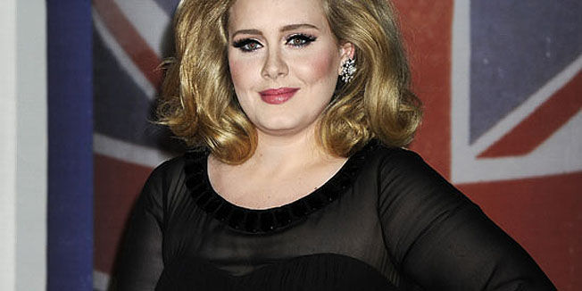 Performer Adele arrives for the Brit Awards 2012 at the O2 Arena in London, Tuesday, Feb. 21, 2012. (AP Photo/Jonathan Short)