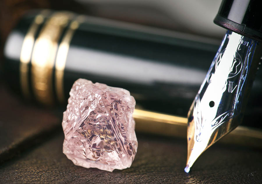 An undated handout photo released by mining giant Rio Tinto on February 22, 2012 shows a 12.76 carat pink diamond -- the largest of the rare and precious stones ever found in Australia. Named the Argyle Pink Jubilee, the rough stone was found at Rio's pink diamond operations in the Kimberley region of western Australia and would take 10 days to cut and polish in Perth.  --- EDITORS NOTE --- RESTRICTED TO EDITORIAL USE MANDATORY CREDIT  NO MARKETING NO ADVERTISING CAMPAIGNS - DISTRIBUTED AS A SERVICE TO CLIENTS   AFP PHOTO / HO / RIO TINTO