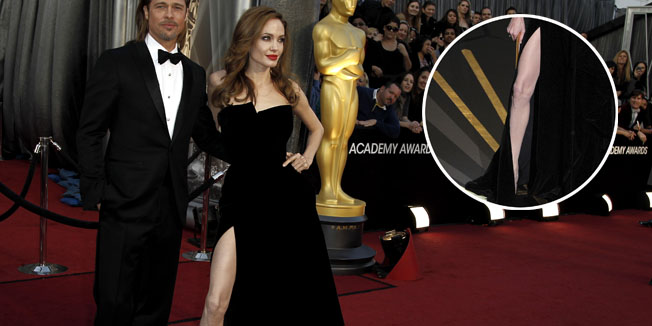 Brad Pitt, left, and Angelina Jolie arrive before the 84th Academy Awards on Sunday, Feb. 26, 2012, in the Hollywood section of Los Angeles. (AP Photo/Matt Sayles)