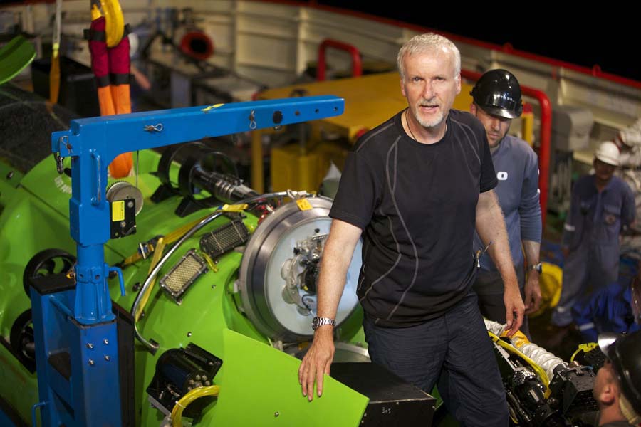 FILE - This February 2012 file photo provided by National Geographic, shows explorer and filmmaker James Cameron emerging from the hatch of DEEPSEA CHALLENGER during testing of the submersible in Jervis Bay, south of Sydney, Australia. Cameron on Sunday, March 25, 2012 began his journey  to someplace only two men have gone before  to the Earth's deepest point. The director of 