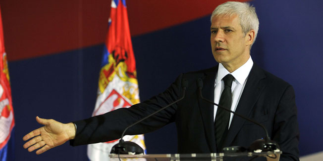 Serbian President Boris Tadic gestures during a joint press conference with Chief Prosecutor of The Hague Serge Brammertz after their meeting in Belgrade on September 13, 2011. Brammertz arrived on his first visit to Belgrade after the arrest of Hague indictees Ratko Mladic and Goran Hadzic, and immediately upon his arrival, he met with the representatives of the Action Team for for Cooperation with the Hague.   AFP PHOTO / ANDREJ ISAKOVIC