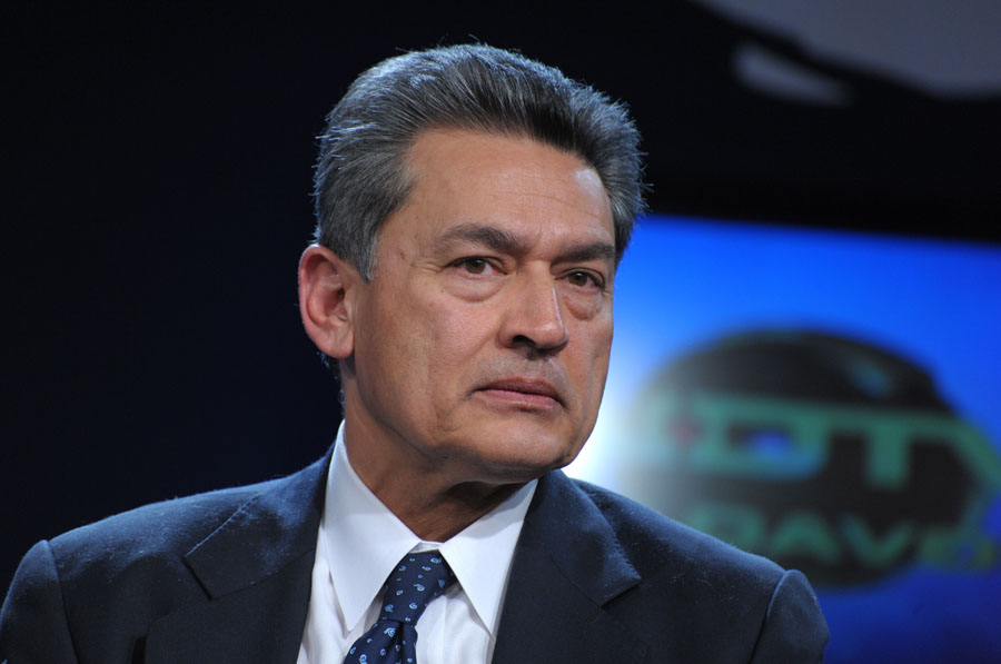(FILES) This January 28, 2010 file photo shows Rajat Gupta, senior partner emeritus at McKinsey and Company las he listens during a televised session by Indian NDTV at the World Economic Forum in Davos. Rajat Gupta, a former director of Goldman Sachs and the longtime head of the prestigious McKinsey international consultancy, surrendered to the FBI October 26, 2011 on insider trading charges. An FBI spokesman said Gupta, who is facing charges linked to the insider trading scandal centered on hedge fund magnate Raj Rajaratnam, surrendered at 8:10 am (1210 GMT) and was due to later appear in a New York court. Charges against Gupta would mark a stunning reversal for one of America's elite executives.  AFP PHOTO/ERIC PIERMONT