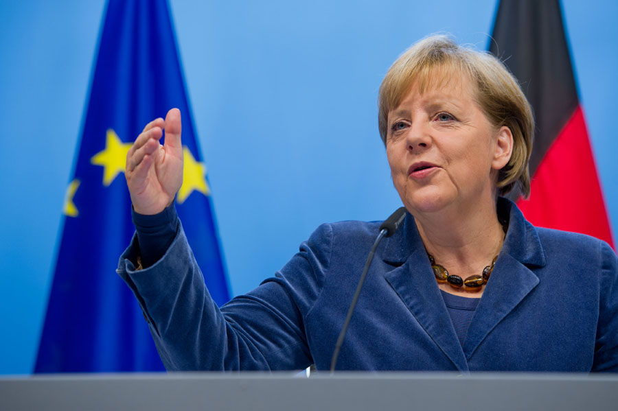 German Chancellor Angela Merkel speaks during a media conference after an EU summit in Brussels on Thursday, Oct. 27, 2011. A European Union official says the currency union's leaders have reached a deal with banks to take losses of 50 percent of their Greek bonds in a key move to solve the eurozone's debt crisis. (AP Photo/Geert Vanden Wijngaert)